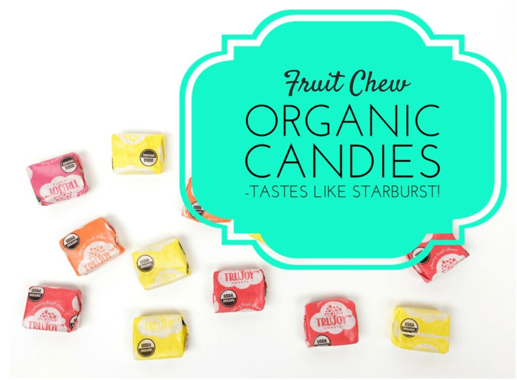 colorful organic fruit chew candies against white background