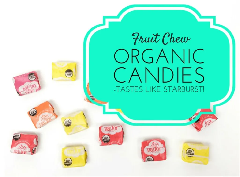 colorful organic fruit chew candies against white background