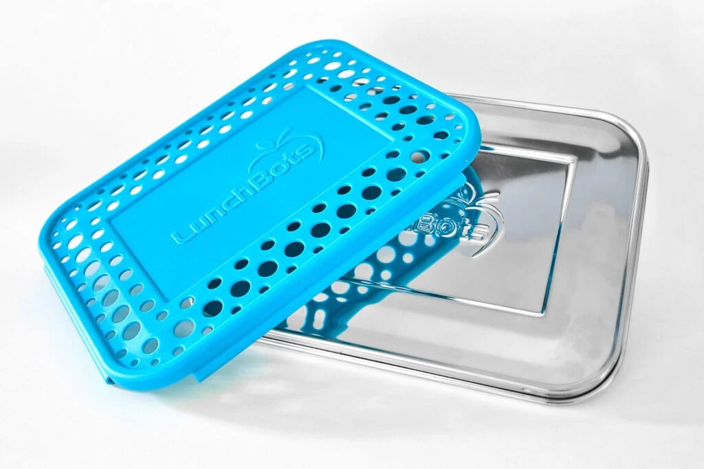 stainless steel bento box lid with removable blue plastic cover lunchbots