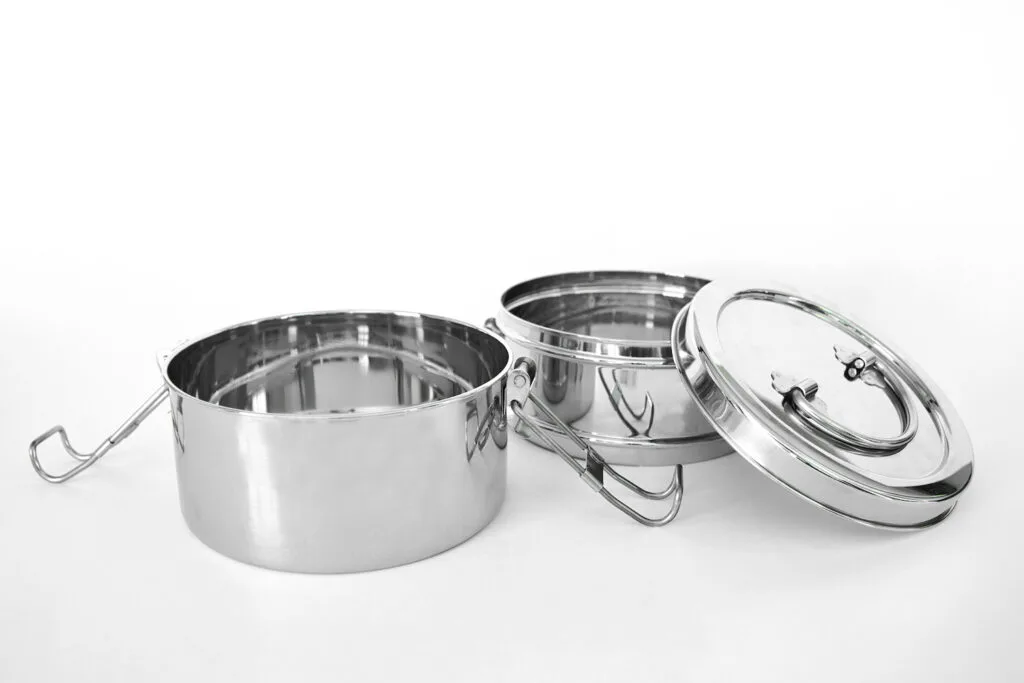 stainless steel tiffin lunchbox containers on white background