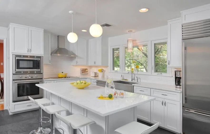 How to create an all white kitchen for a healthy home. Non-toxic ways to update your kitchen cabinets, countertops, backsplash and more.