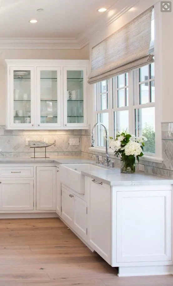 How to create an all white kitchen for a healthy home. Non-toxic ways to update your kitchen cabinets, countertops, backsplash and more.