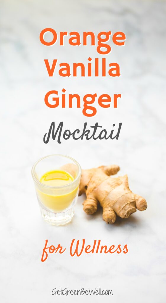 piece of ginger root next to small glass of orange liquid