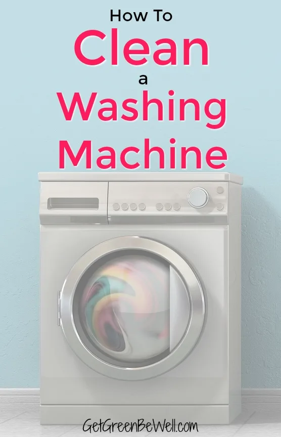 A front view of a regular brushed metal washing machine filled with clothing in an empty room with a shiny tiled floor and a baby blue wall