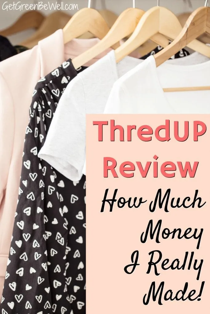 thredup reviewwhite black and pink women's clothing hangin on wooden hangers in closet