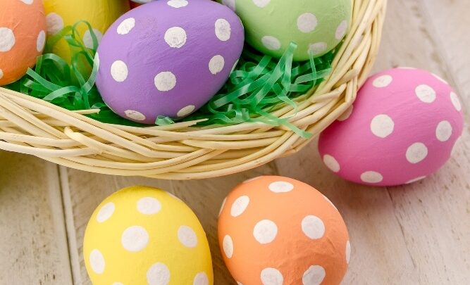 polka dot eggs in an Easter basket with grass