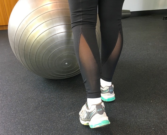 sustainable atheleisure wear black leggings with mesh inserts on back of calves