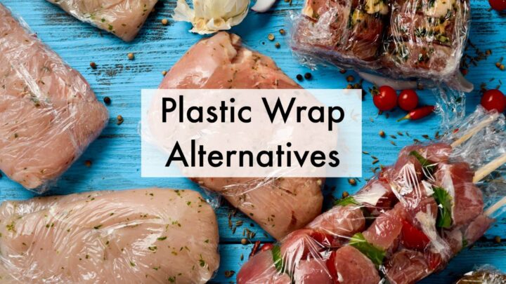 high-angles shot of a blue rustic wooden table, with different packages of raw meat, such as turkey skewers, pork medallions, or slices and chicken breasts wrapped in plastic, ready to be frozen