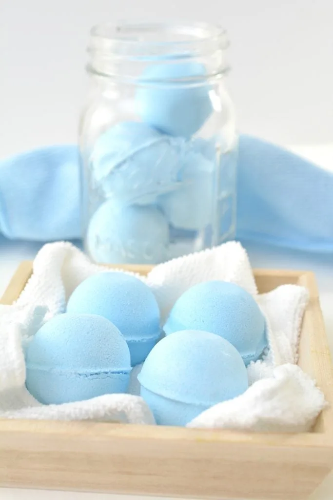 blue toilet bowl cleaner tablets in a glass jar