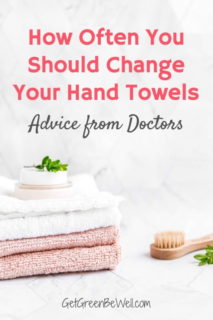 white and pink hand towels folded on counter