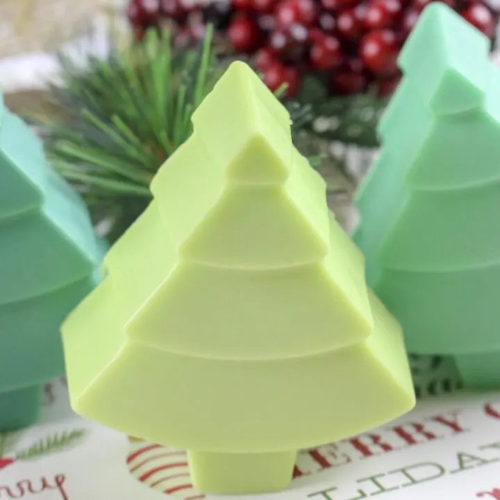three Christmas tree soaps in different shades of green