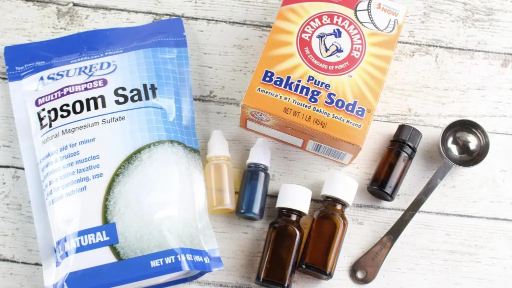 Sinus Congestion relief bath salts recipe ingredients bag of epsom salt box of baking soda essential oil bottles and coloring