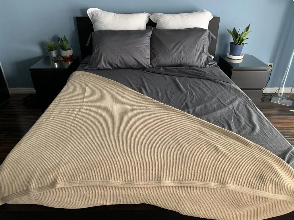 grund america organic cotton bed sheets slate gray on bed with driftwood throw blanket