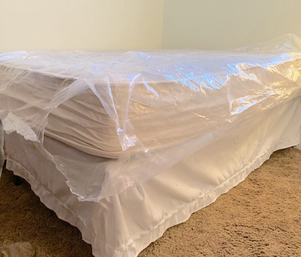 joybed mattress wrapped in plastic on bed frame