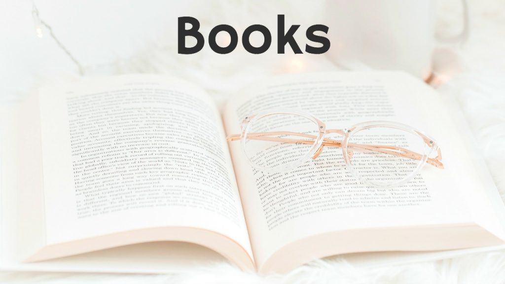 zero waste living idea open book with reading glasses on pages