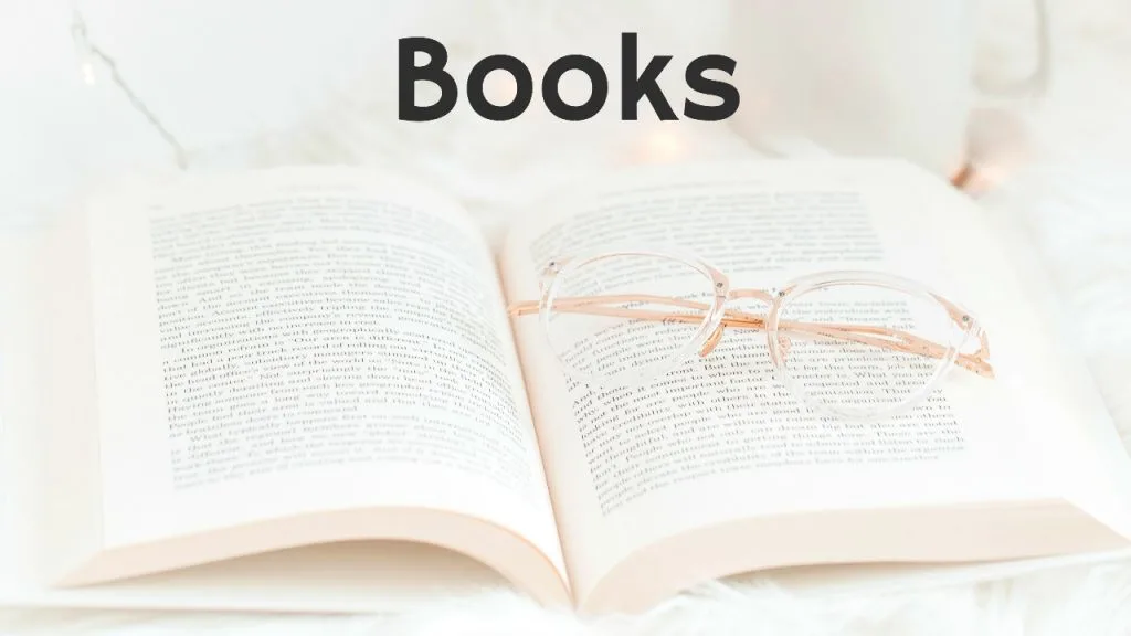 zero waste living idea open book with reading glasses on pages