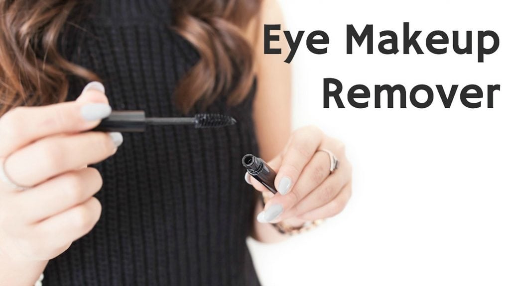 woman wearing black holding mascara wand in her hand zero waste living tips