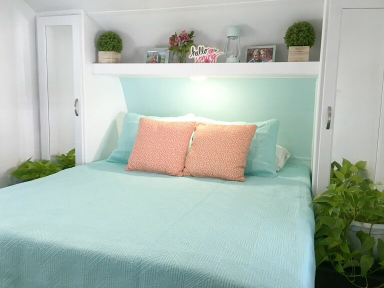 RV Mattress in bedroom with blue comforter