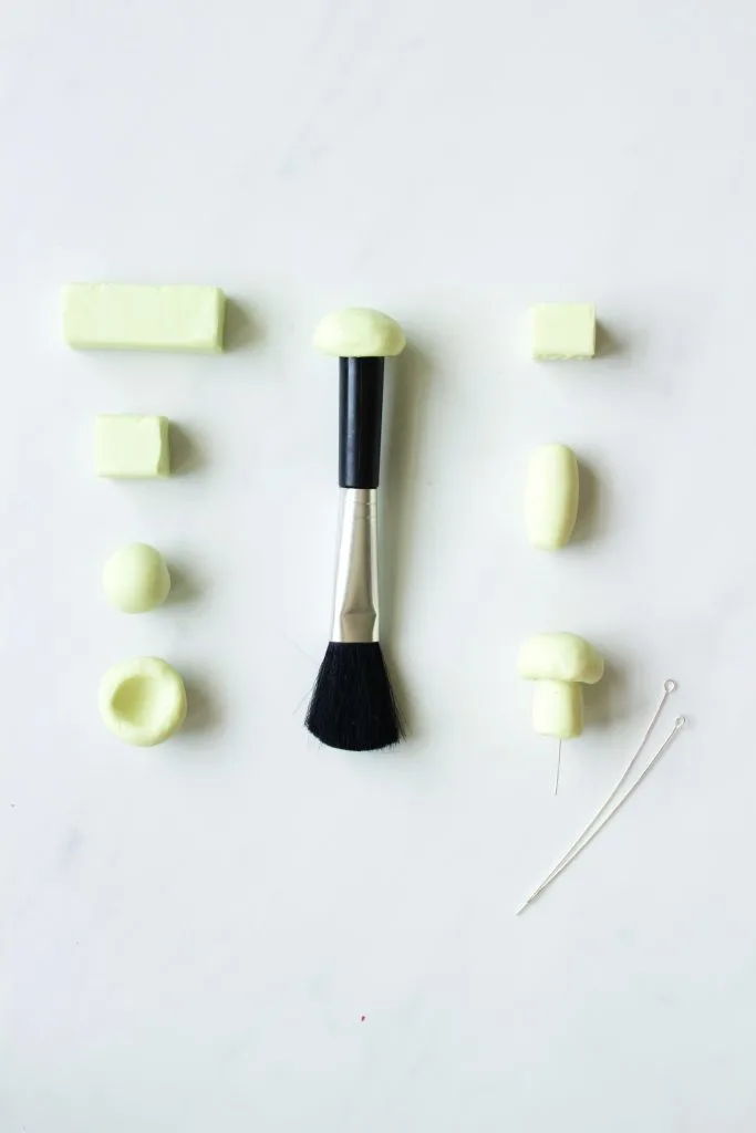 sculpting mushrooms from clay for terrarium