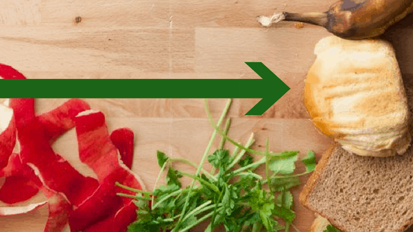 stale bread food waste on wooden board