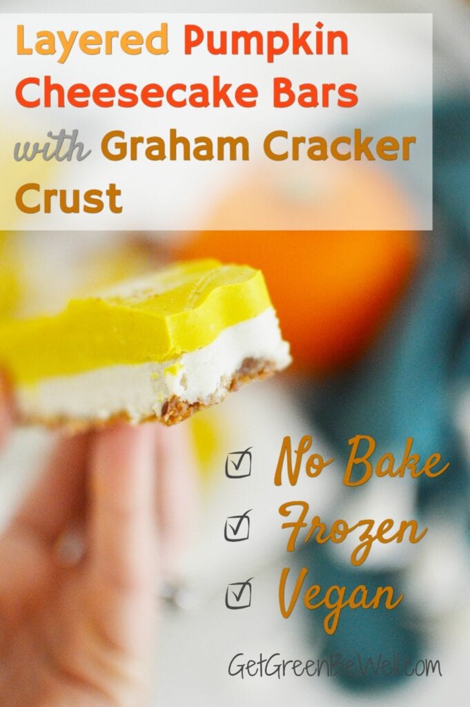 woman holding a layered pumpkin cheesecake bar with graham cracker crust