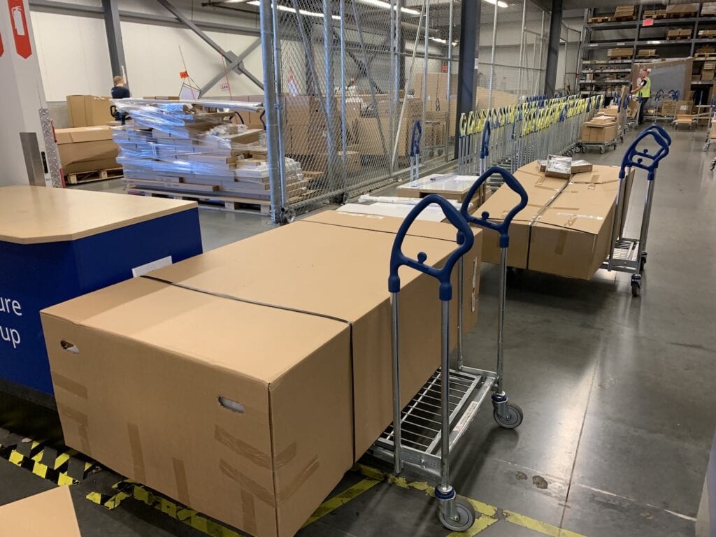 IKEA USA furniture boxes on carts to be picked up online order