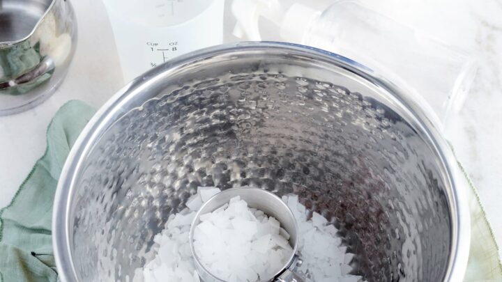 magnesium flakes in silver bowl for magnesium topical spray recipe
