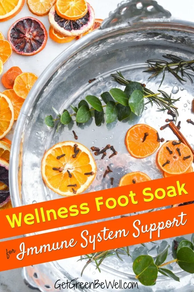 foot soak basin filled with oranges and herbs