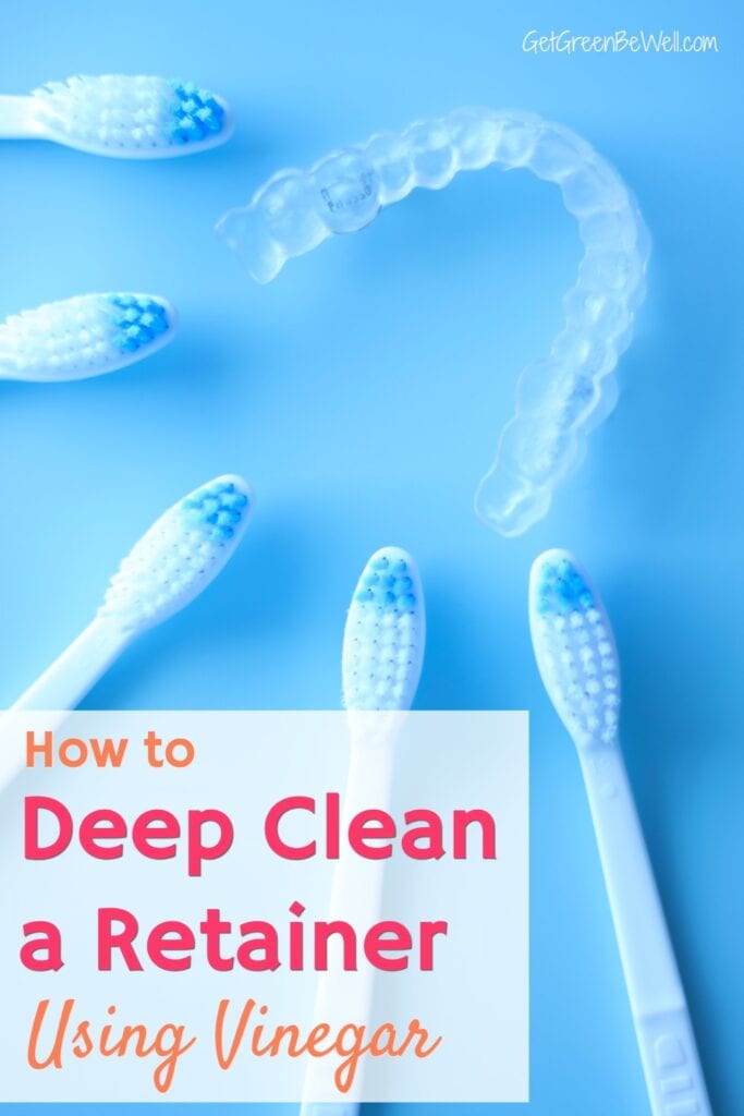 toothbrushes next to clear plastic retainer on blue background