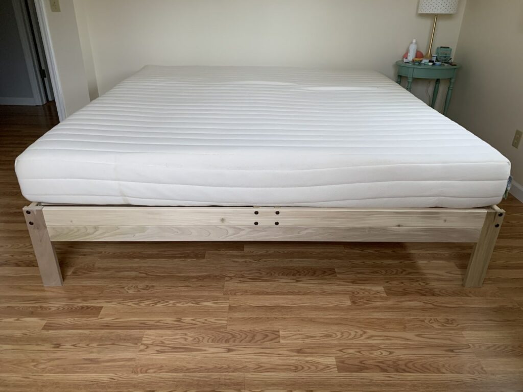 mattress on solid wood platform bed frame