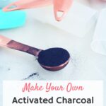 charcoal powder in copper measuring spoon on white countertop