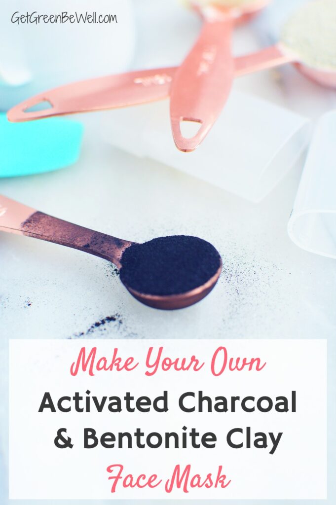 charcoal powder in copper measuring spoon on white countertop
