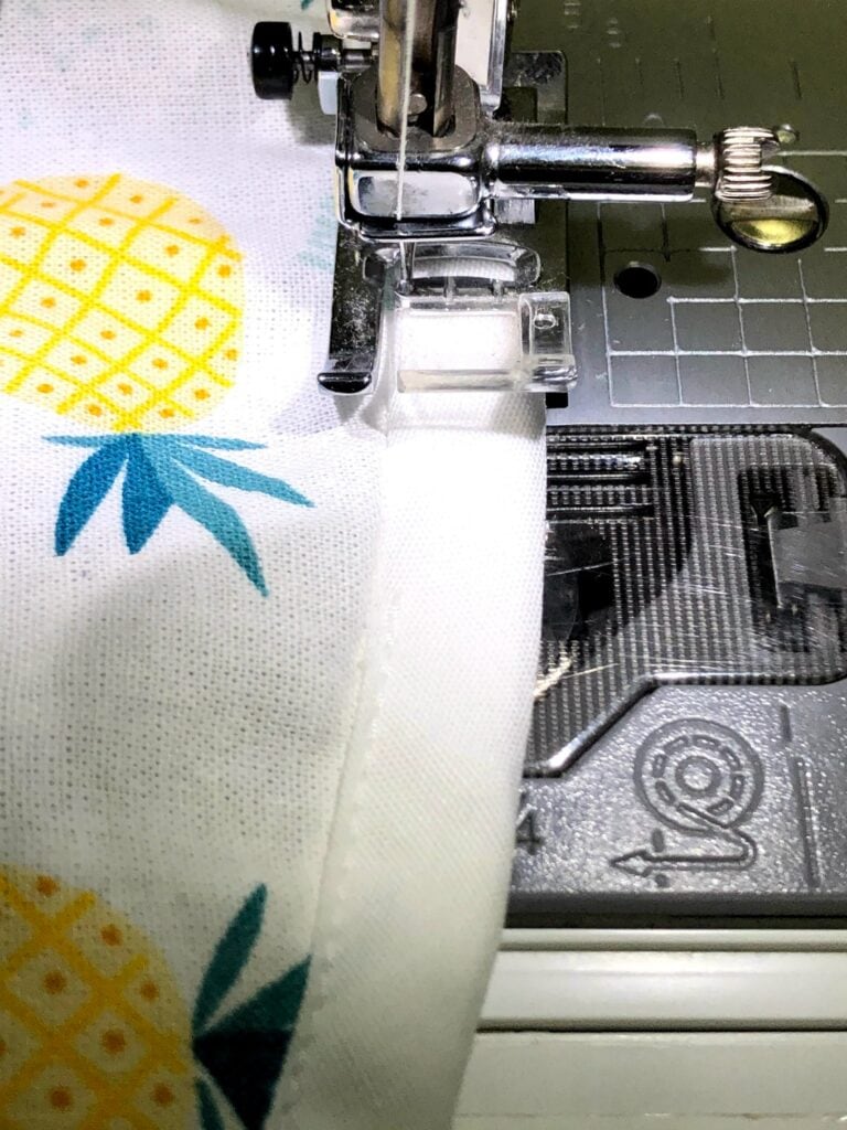 fabric under sewing machine foot