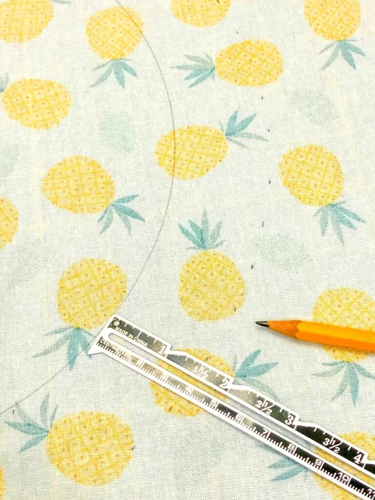 ruler and pencil on fabric
