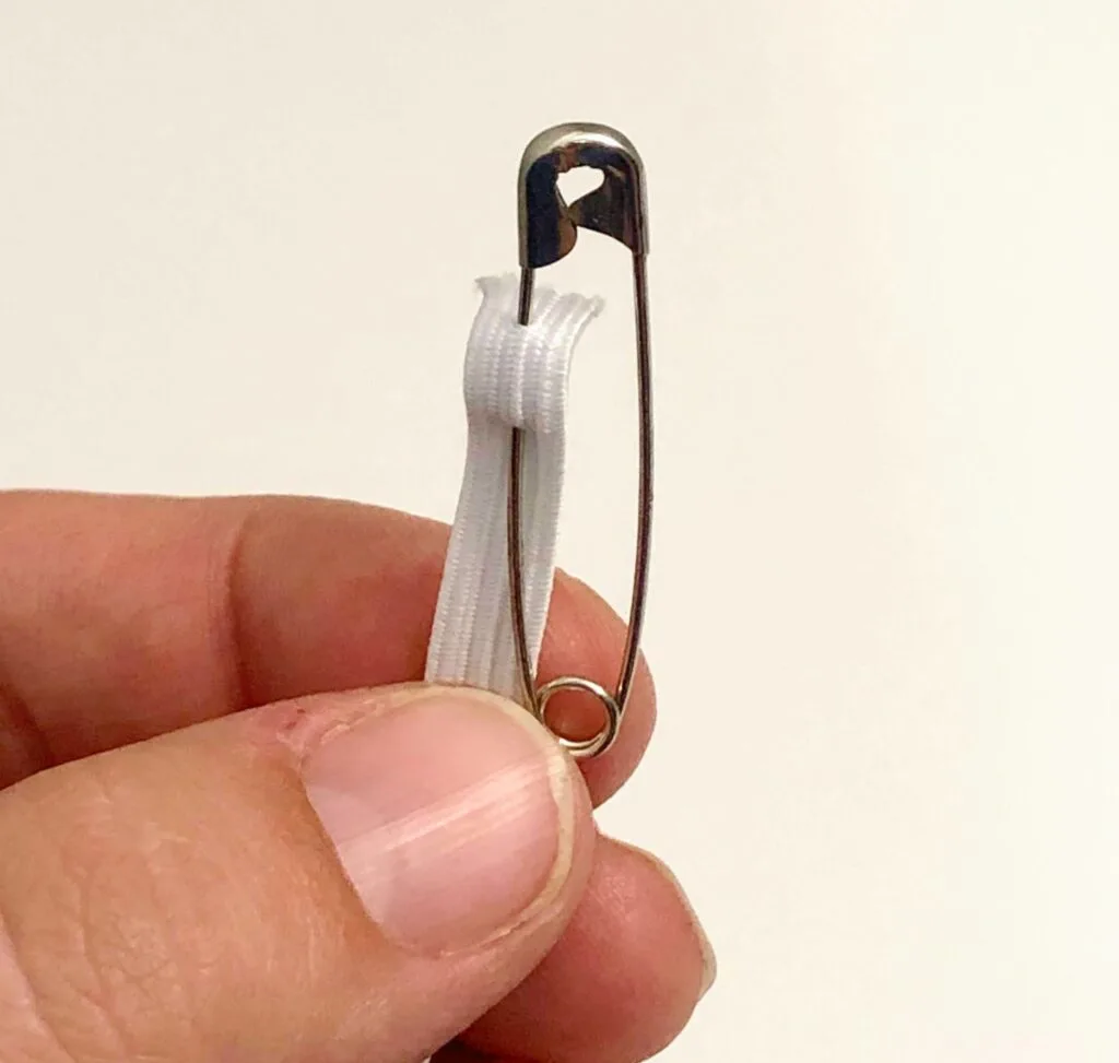 safety pin attached to elastic
