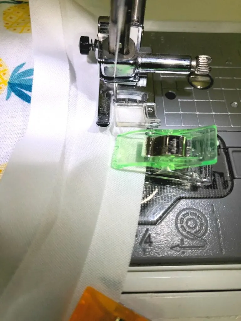 bias tape under sewing machine needle