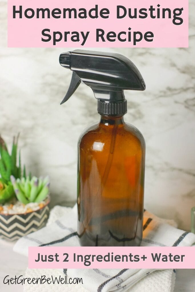 brown glass spray bottle on dust cloths