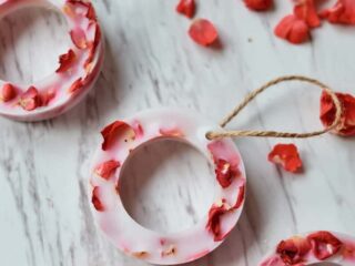 hanging wax circles with dried rose petals