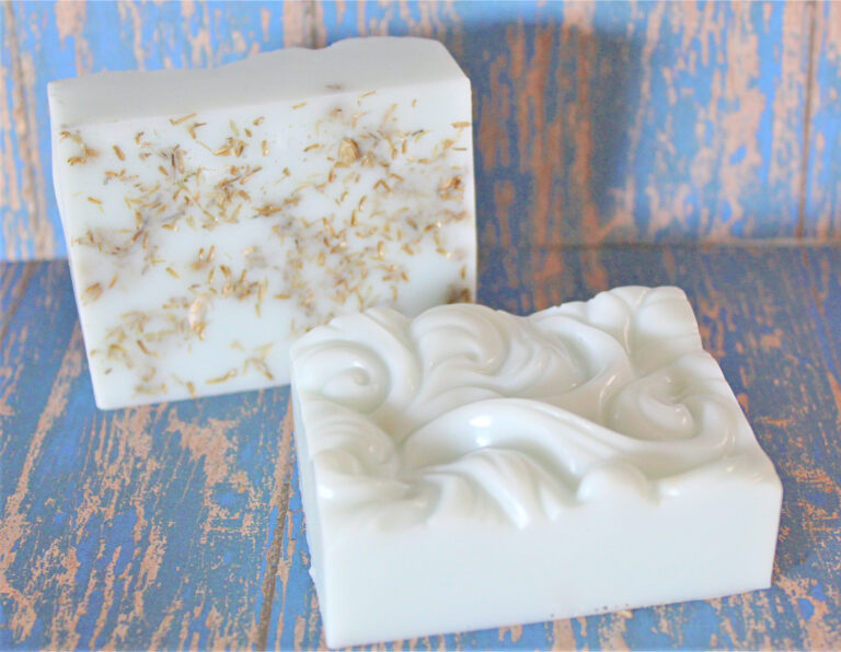 yarrow soaps on blue weathered wood background