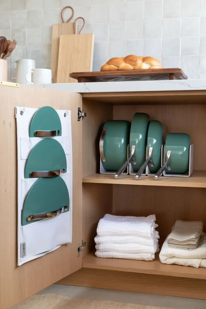 https://www.getgreenbewell.com/wp-content/uploads/2022/06/Caraway-Storage-for-Pots-and-Lids-682x1024.jpg.webp