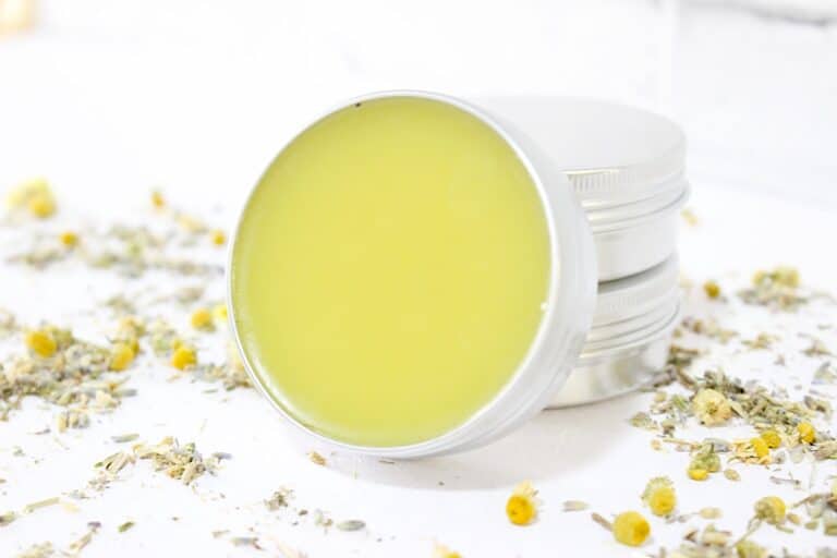 Cramp Cream surrounded by dried flowers.